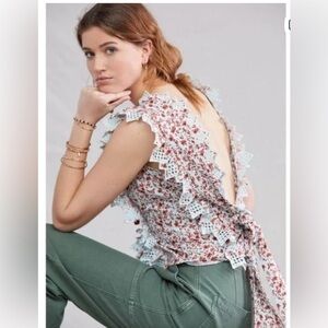 ANTHROPOLOGIE BLUE TASSEL COTTON TRINA BOW SLIGHTLY
CROPPED BLOUSE